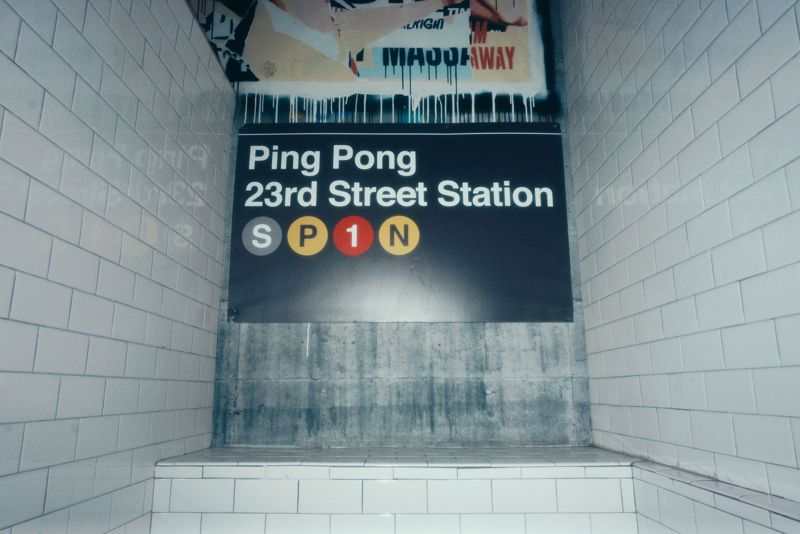 Ping Pong 23rd Street Station sign on a tiled wall
